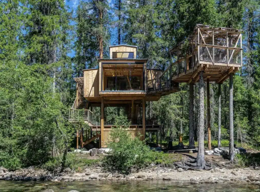 A treehouse Airbnb over a river in Norway.